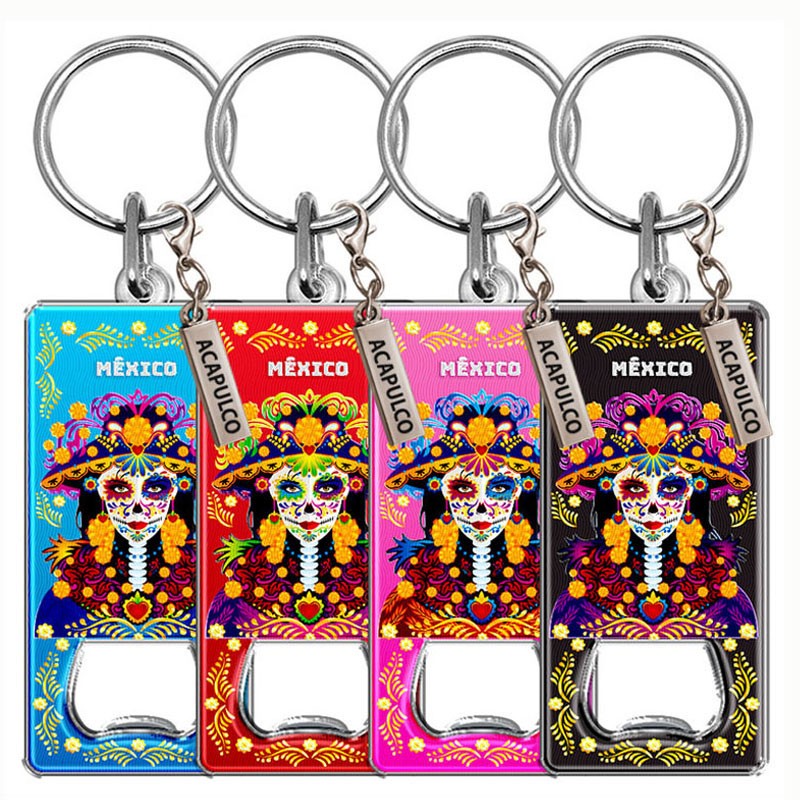 Llavero destapador de metal con una catrina. Souvenir de Acapulco, México.