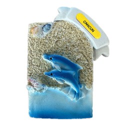 Magneto de resina con unos delfines. Souvenir de Cancún, México