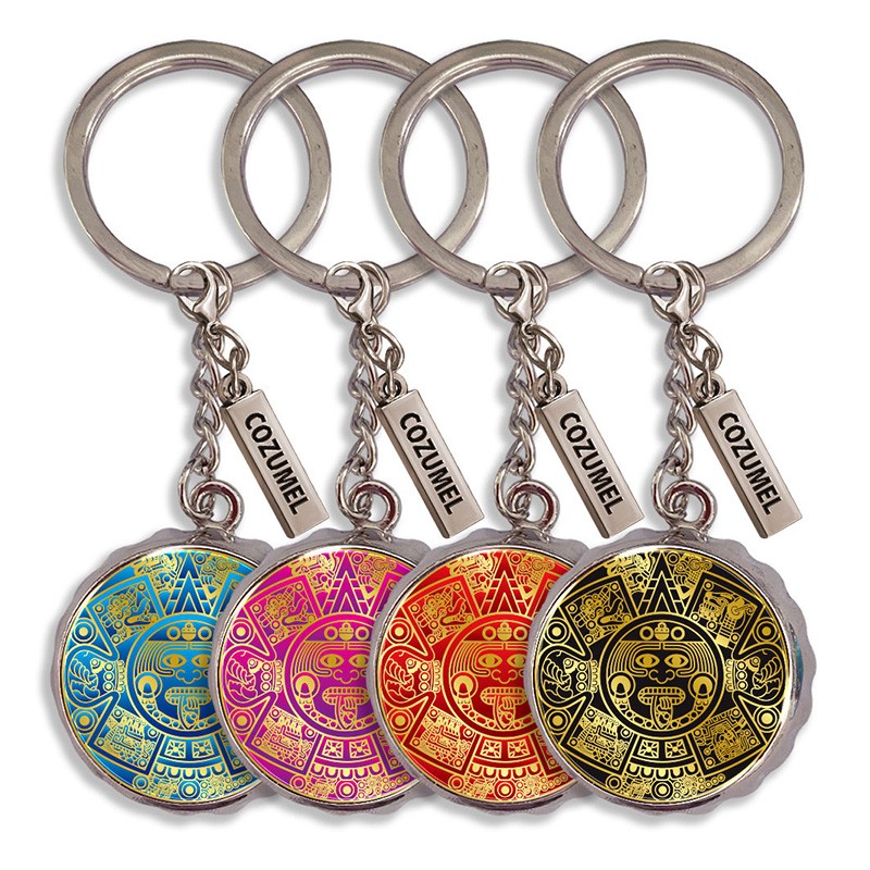 Llavero destapador corcholata de metal con calendario Azteca. Souvenir de Cozumel, Mexico