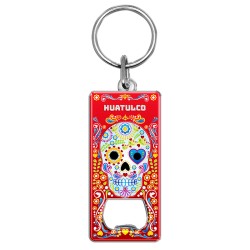 Llavero destapador de metal con calavera. Souvenir de Huatulco, Mexico