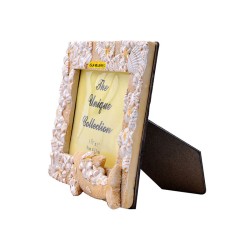 Portaretrato mediano  de resina con acabado arena y un delfín, souvenir y recuerdo de Isla Mujeres, Mexico.