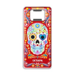 Destapador de metal con una calavera. Souvenir de Ixtapa, México.