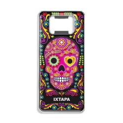 Destapador de metal con una calavera. Souvenir de Ixtapa, México.