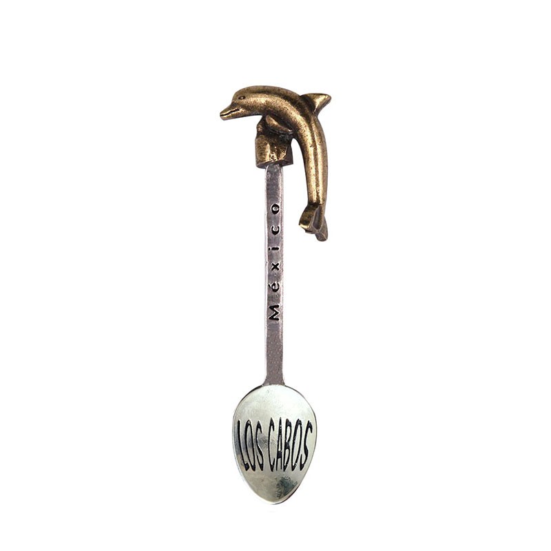 Cuchara de colección latón con la figura de un delfín. Souvenir de Los Cabos, México