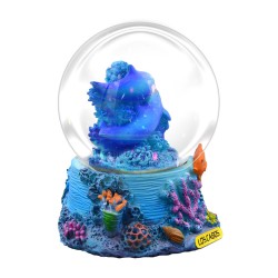 Esfera de nieve con unos delfines. Souvenir de Los Cabos, México