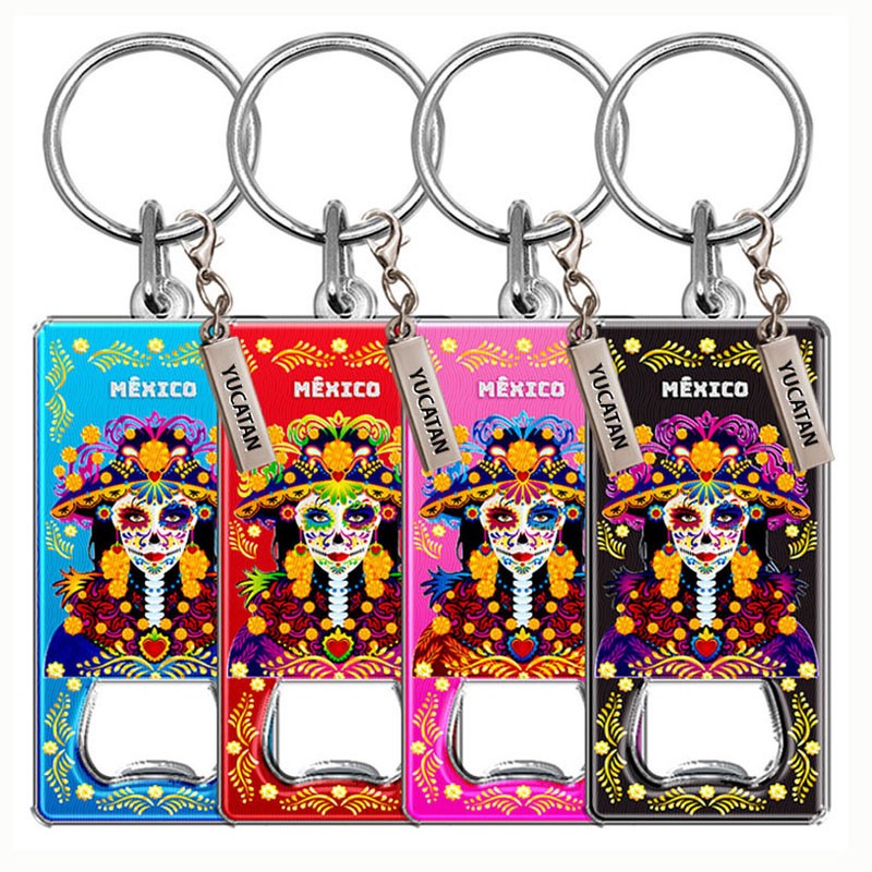 Llavero destapador de metal con una catrina. Souvenir de la península de Yucatán, México.