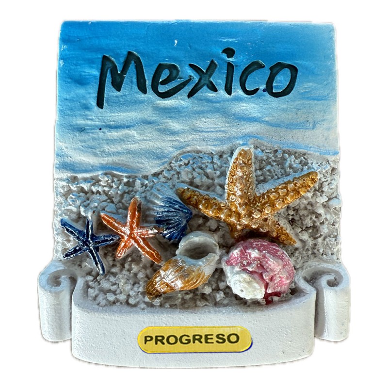 Magneto de resina con unas conchas. Souvenir de Yucatan, México