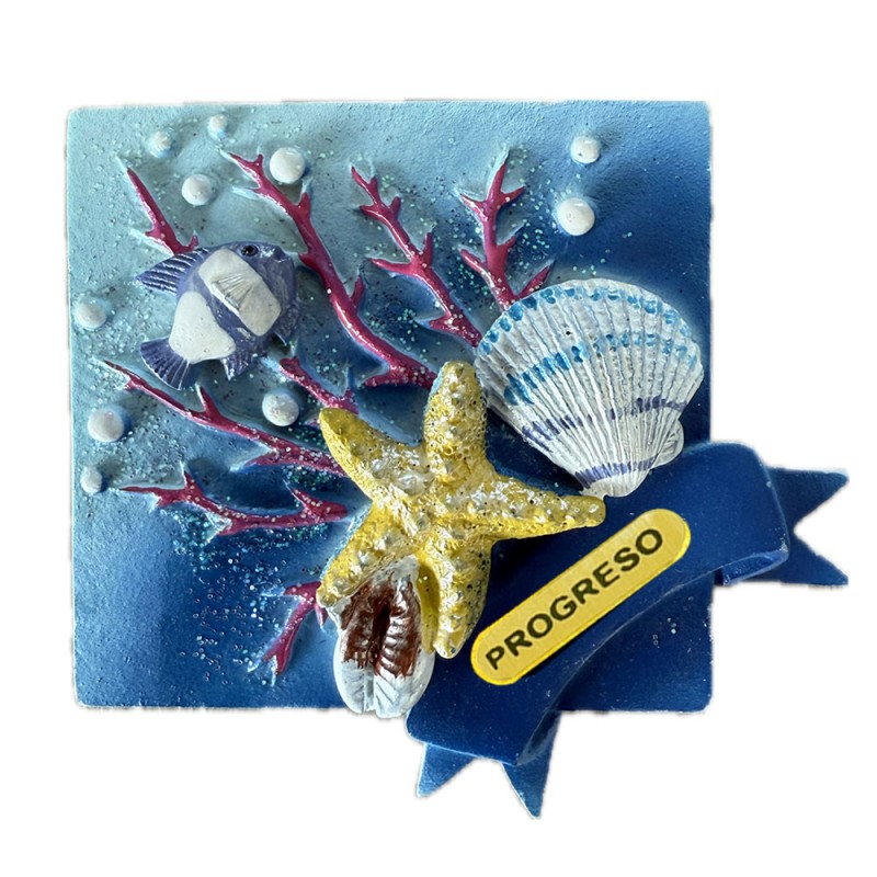 Magneto de resina con unas conchas y un coral. Souvenir de Yucatan, México