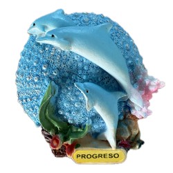 Magneto de resina con unos delfines y una concha. Souvenir de Yucatan, México