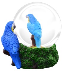 Esfera de nieve con un perico. Souvenir de Yucatán, México