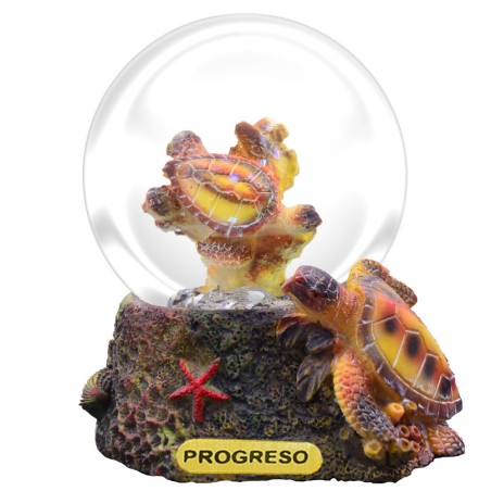 Esfera de nieve con una tortuga. Souvenir de Yucatán, México