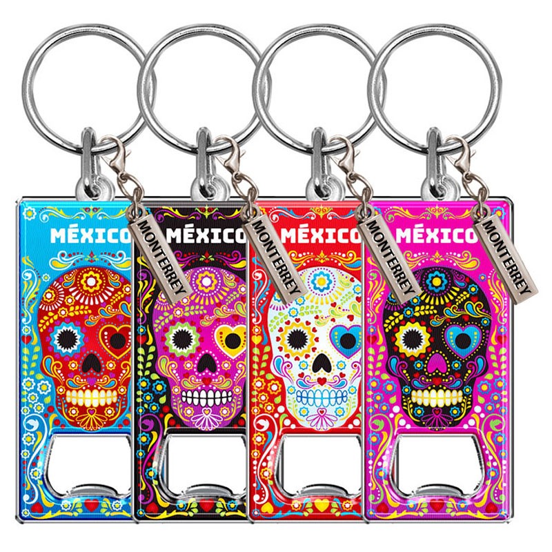 Llavero destapador de metal con calavera. Souvenir y recuerdo de Monterrey, Mexico.