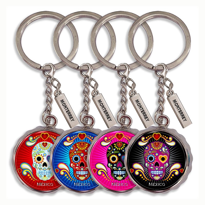 Llavero corcholata de metal calavera, Souvenir de Monterrey, México.