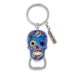 Llavero destapador de metal en forma de calavera. Souvenir de Monterrey, México.