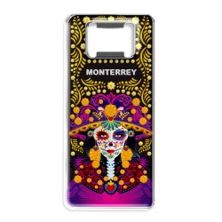 Destapador de metal con una catrina. Souvenir de Monterrey, México.
