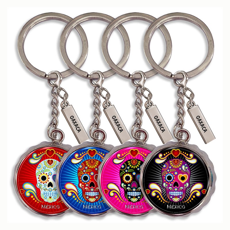 Llavero corcholata de metal calavera, Souvenir de Oaxaca, México.
