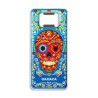Destapador de metal con una calavera. Souvenir de Oaxaca, México.