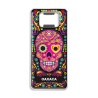 Destapador de metal con una calavera. Souvenir de Oaxaca, México.