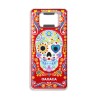 Destapador de metal con una calavera. Souvenir de Oaxaca, México.