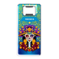 Destapador de metal con una catrina. Souvenir de Oaxaca, México.