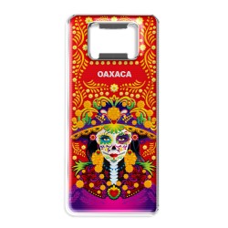 Destapador de metal con una catrina. Souvenir de Oaxaca, México.