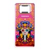 Destapador de metal con una catrina. Souvenir de Oaxaca, México.