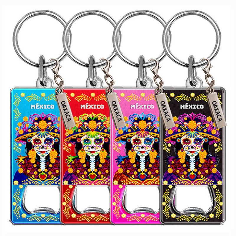 Llavero destapador de metal con una catrina. Souvenir de Oaxaca, México.