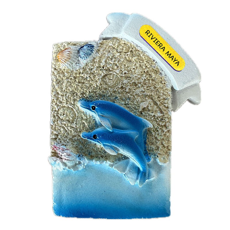 Magneto de resina con unos delfines. Souvenir de la Riviera Maya, México