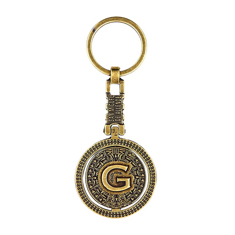 Llavero de laton letra G con el Calendario Azteca, souvenir o regalo de San Miguel Allende, Mexico.