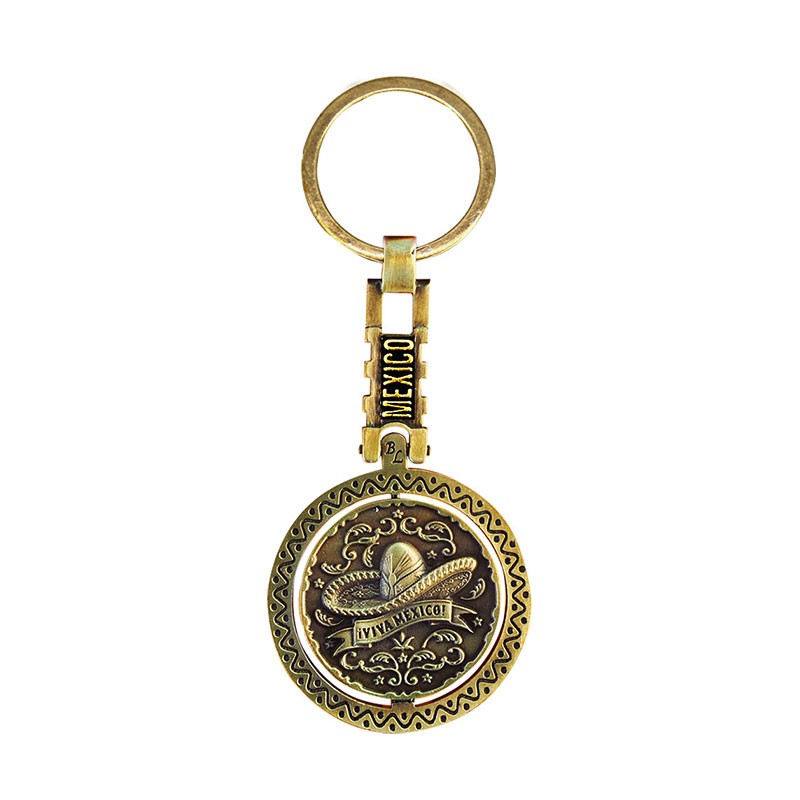 Llavero giratorio de latón con un sombero. Souvenir de la Ciudad de México, CDMX.