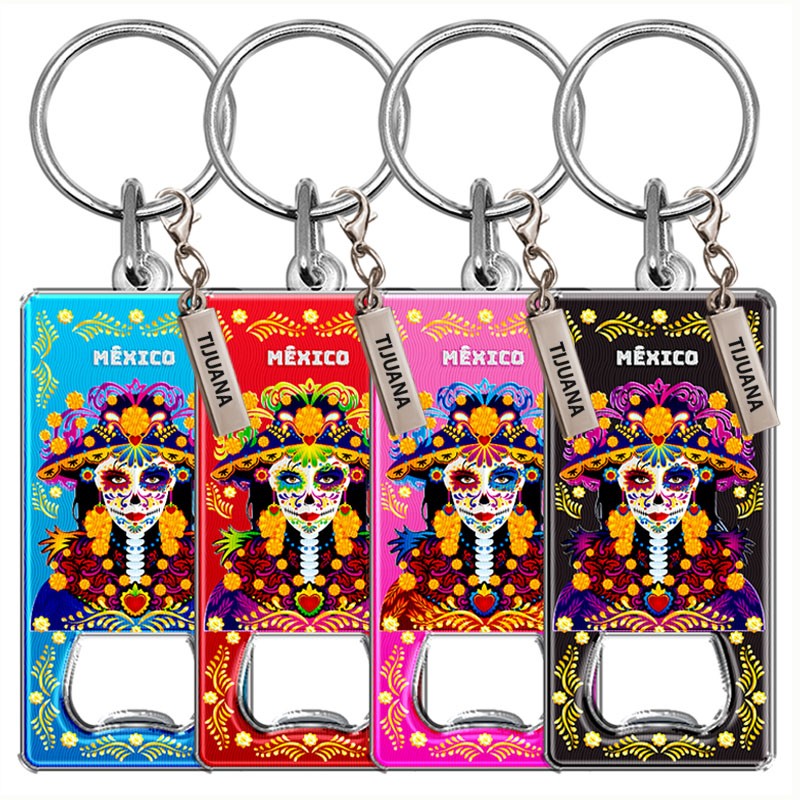 Llavero destapador de metal con una catrina. Souvenir de Tijuana, México.