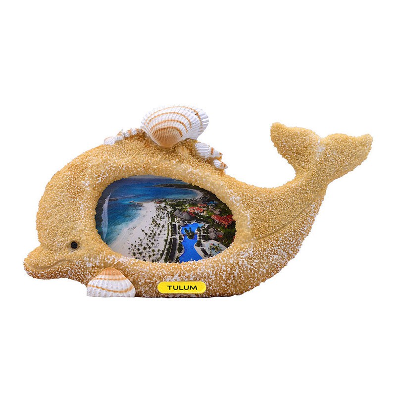 Portaretrato chico  de resina con acabado Arena en forma de un delfín