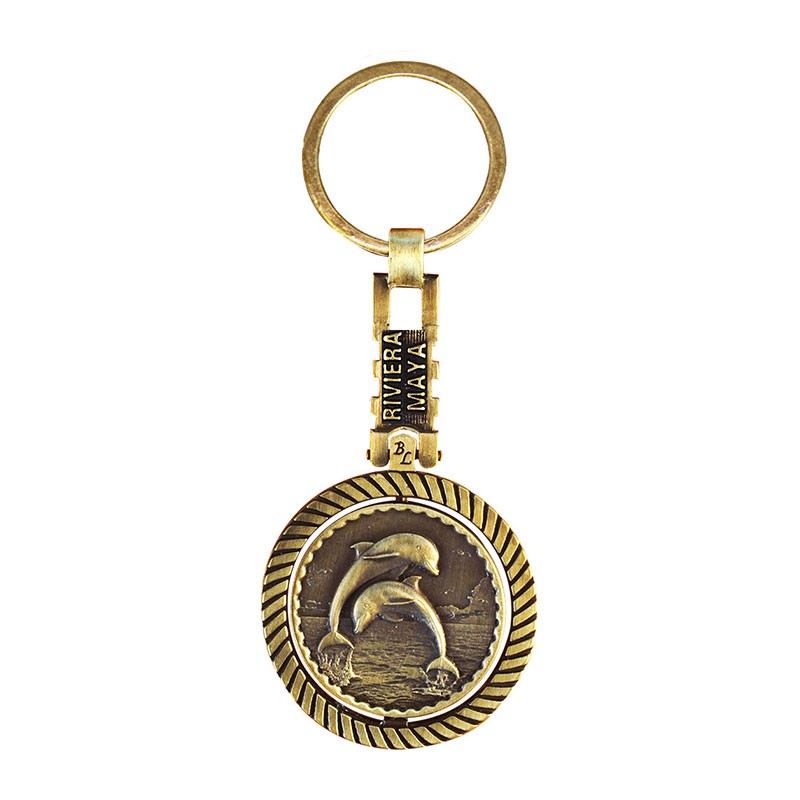Llavero giratorio de latón delfín. Souvenir, recuerdo Riviera Maya, México