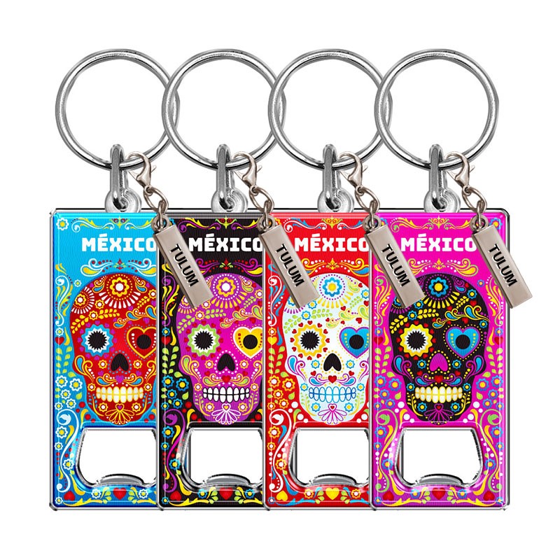 Llavero destapador de metal con calavera. Souvenir de la Riviera Maya, México