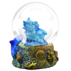 Esfera de nieve con un Delfin.  Souvenir, recuerdo de la Riviera Maya, México